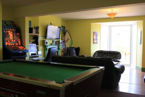 The Green House Surf Lodge